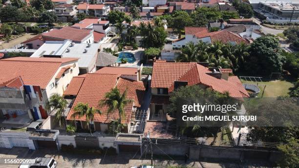 An aerial view of the housing development where anti-narcotics police searched a house during an operation to try to arrest Uruguayan Sebastian...