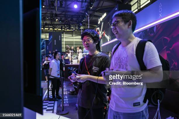 Attendees play video games at the ChinaJoy Expo in Shanghai, China, on Sunday, July 30, 2023. The event runs through July 31. Photographer: Qilai...