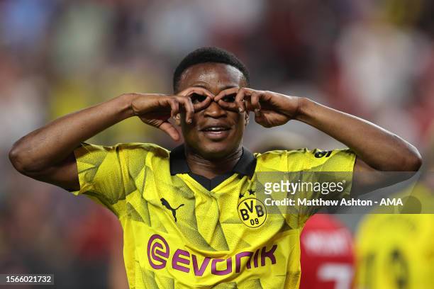 Youssoufa Moukoko of Borussia Dortmund celebrates after scoring a goal to make it 2-3 during the pre-season friendly match between Manchester United...