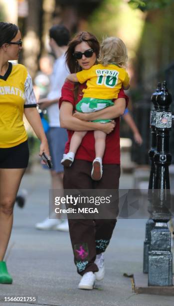 Emily Ratajkowski is seen carrying her son on July 30, 2023 in New York, New York.