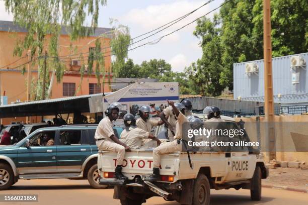 July 2023, Niger, Niamey: Police officers on the sidelines of a march in support of the coup plotters in Niamey. Photo: Djibo Issifou/dpa