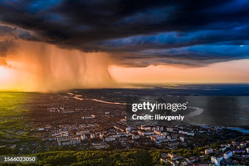 Rain storm cloud aerial view. Evening landscape drone photography. Sustainability. Weather Rain storm cloud aerial view. Evening landscape drone photography. Sustainability. Weather