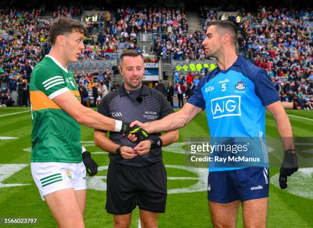 Dublin , Ireland - 30 July 2023; Referee David Gough with the Kerry and Dublin captains, David Clifford and James McCarthy, ahead of the GAA Football...