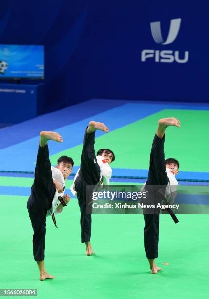 Luu Quyen phuoc, Bui Anh Tuan, Nguyen Ngoc Minh Hy of Vietnam compete during the final of men's Team Poomsae of Taekwondo at the 31st FISU Summer...