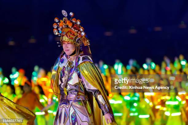 Ren Xin performs during an opening ceremony rehearsal in Chengdu of southwest China's Sichuan Province, on July 23, 2023. Ren Xin, a 19-year-old...