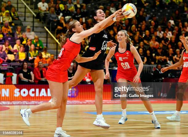 Lucy Howells of Wales and Ameliaranne Ekenasio of New Zealand in action during the Netball World Cup 2023, Pool G match between Wales and New Zealand...