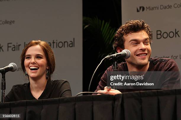 Zoey Deutch and Alden Ehrenreich attends Warner Bros. "Beautiful Creatures" Authors And Cast At Miami Book Fair on November 17, 2012 in Miami,...