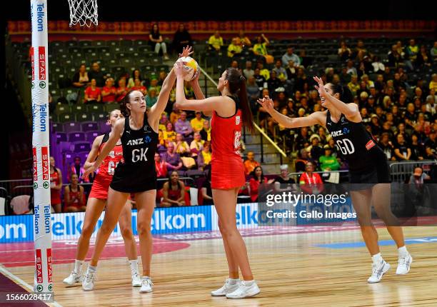 Kelly Jury of New Zealand blocks Georgia Rowe of Wales during the Netball World Cup 2023, Pool G match between Wales and New Zealand at Cape Town...