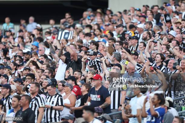 Newcastle United fans cheer from the stands in the first half during a Premier League Summer Series match between Aston Villa and Newcastle United at...