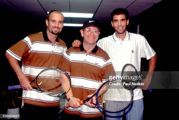 British musician Elton John poses with American tennis players Andre Agassi and Pete Sampras, Chicago, Illinois, 1993.
