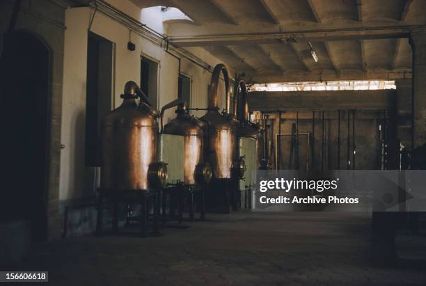 Perfume stills in Grasse, France, circa 1960.