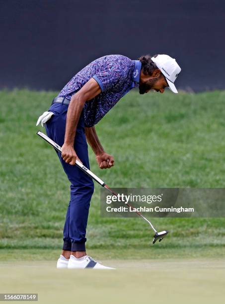 Akshay Bhatia of the United States reacts to his putt on the 18th green to force a playoff during the final round of the Barracuda Championship at...