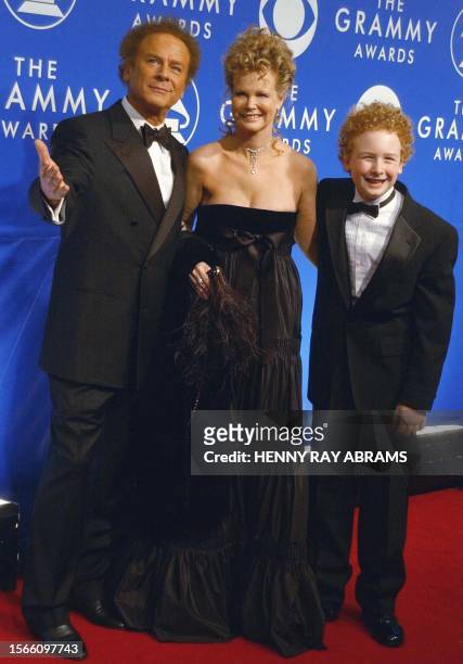 Singer Art Garfunkel , his wife Katherine and son James pose for photographers before the 45th annual Grammy Awards 23 February 2003 at Madison...
