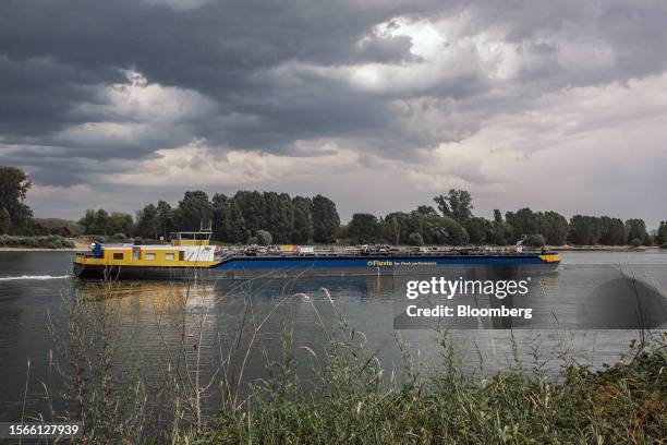 Fluvia HH GmbH tanker barge sails along the Rhine River in Nierstein, Germany, on Wednesday, July 19, 2023. With water regularly receding to levels...