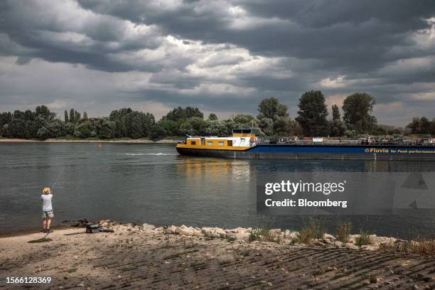 Fluvia HH GmbH bulk carrier barge sails along the Rhine River in Nierstein, Germany, on Wednesday, July 19, 2023. With water regularly receding to...