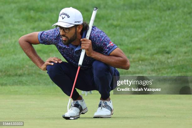 Akshay Bhatia of the United States lines up a putt on the 18th green during the final round of the Barracuda Championship at Tahoe Mountain Club on...