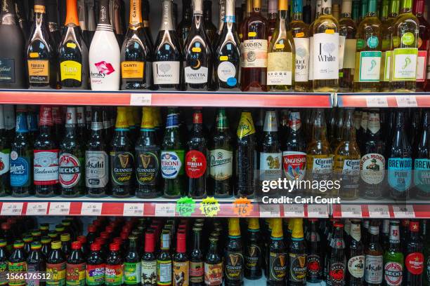 Bottles of alcohol are displayed for sale in a shop on July 31, 2023 in London, England.