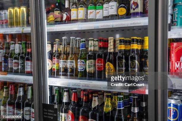 Bottles of alcohol are displayed for sale in a shop on July 31, 2023 in London, England.