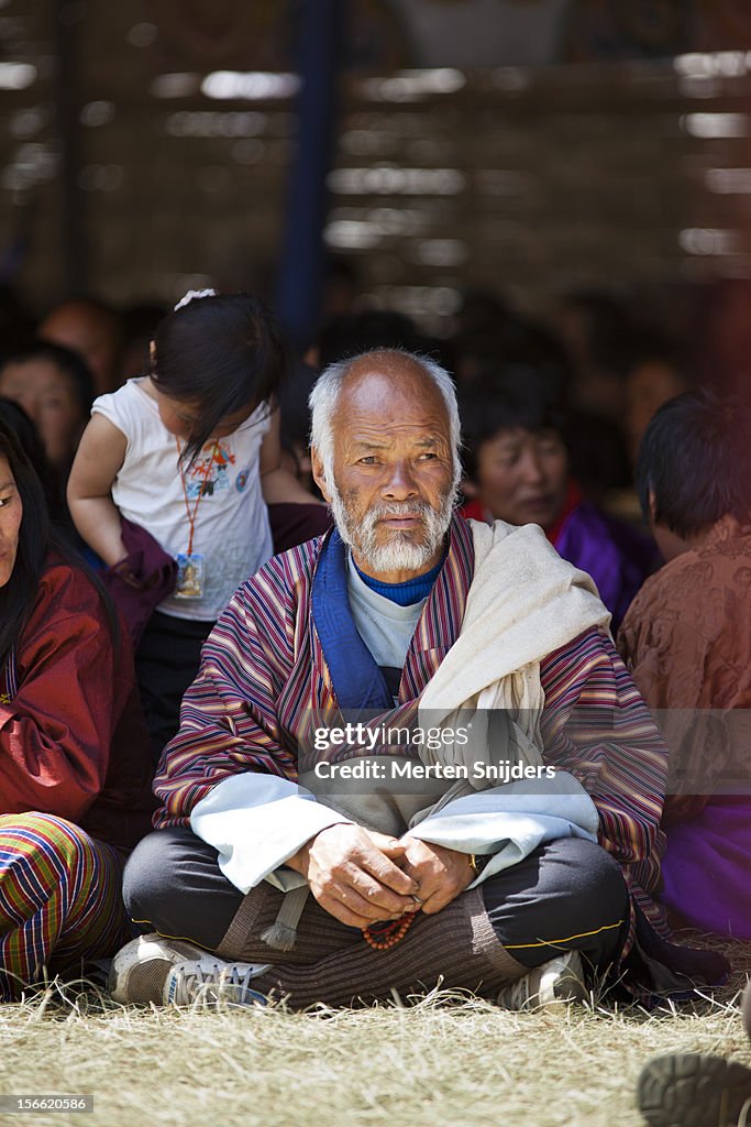 People seated while participating in teachings