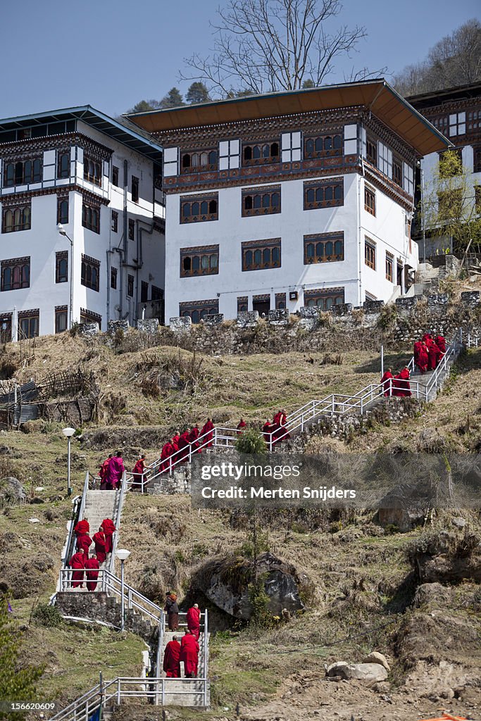 Monks leaving Trongsa Dzong by stairs