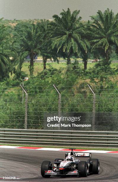 David Coulthard of Great Britain and the McLaren Mercedes Formula One Team in action during this mornings practice session at the Sepang...