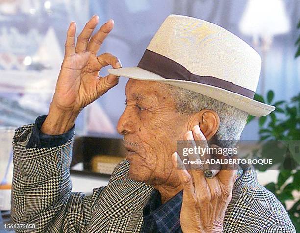 Cuban singer, Francisco Repilado, 92 years, world known as "Compay Segundo", talks on the morning of 08 February, 2000 in a bar in Havana, Cuba. El...