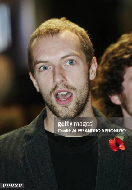 Gwyneth Paltrow's boyfriend, Chris Martin, lead singer of the British band Coldplay arrives for the premiere of the film "Sylvia" at the Odeon,...