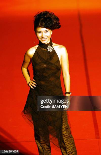 Taiwan pop singer Dear Shunza poses for a photo before the 14th Golden Melody Awards in Taipei 02 August, 2003. More then 50 Taiwan, Hong Kong and...