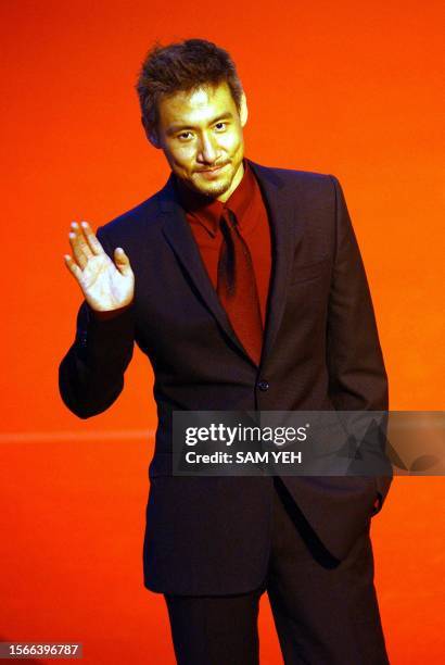 Hong Kong pop singer Jacky Cheung poses before the 14th Golden Melody Awards in Taipei 02 August, 2003. More then 50 Taiwan, Hong Kong and...