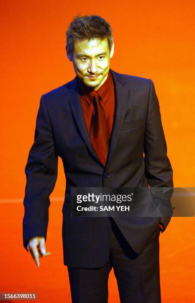 Hong Kong pop singer Jacky Cheung poses before the 14th Golden Melody Awards in Taipei 02 August, 2003. More then 50 Taiwan, Hong Kong and...