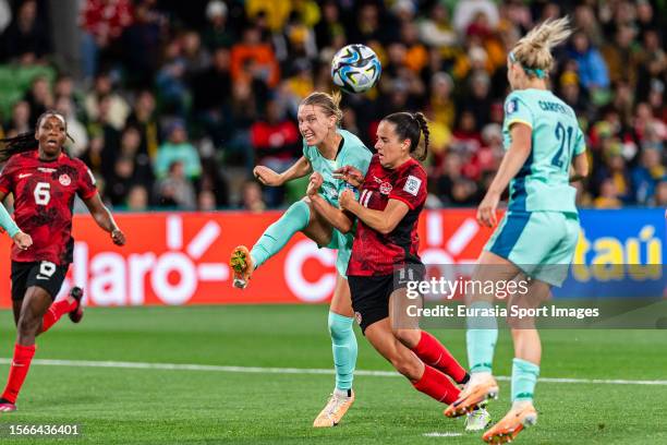 Clare Hunt of Australia battles for the ball with Evelyne Viens of Canada during the FIFA Women's World Cup Australia & New Zealand 2023 Group B...