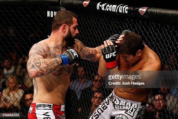 Alessio Sakara throws a punch against Patrick Cote during their middleweight bout during UFC 154 on November 17, 2012 at the Bell Centre in Montreal,...