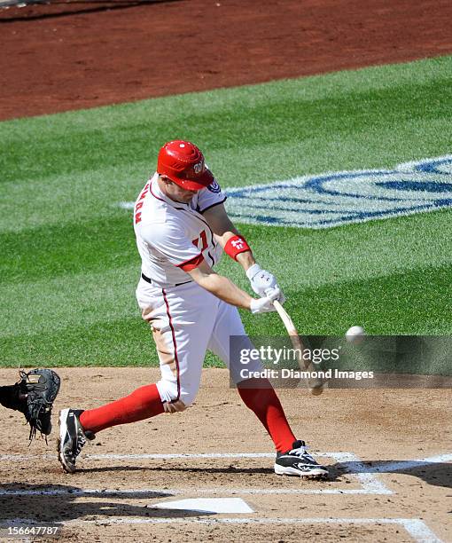 Thirdbaseman Ryan Zimmerman of the Washington Nationals breaks his bat as he singles to rightfield during the bottom of the third inning of Game...