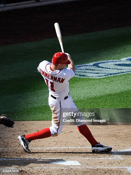 Thirdbaseman Ryan Zimmerman of the Washington Nationals singles to leftfield during the bottom of the fifth inning of Game Three of the National...