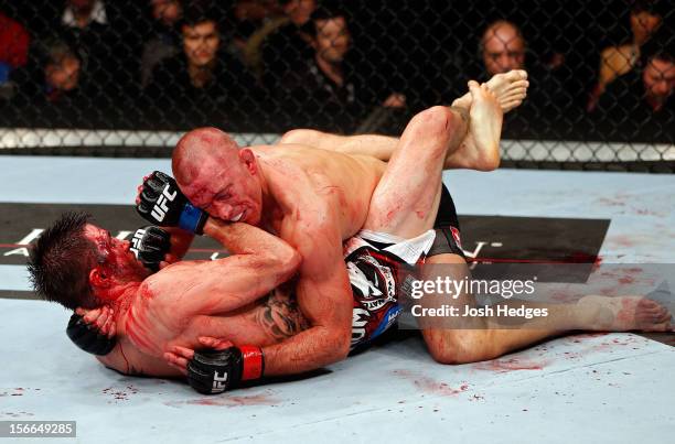 Georges St-Pierre grapples against Carlos Condit in their welterweight title bout during UFC 154 on November 17, 2012 at the Bell Centre in Montreal,...