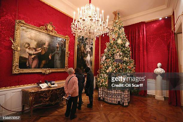 Members of the public admire the Christmas decorations in the Red Ante Room of Waddesdon Manor on November 16, 2012 in Aylesbury, England. The East...