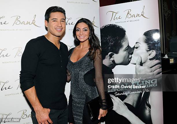 Television personality Mario Lopez and his fiancee Courtney Mazza arrive at Mazza's bachelorette party at The Bank Nightclub at the Bellagio on...