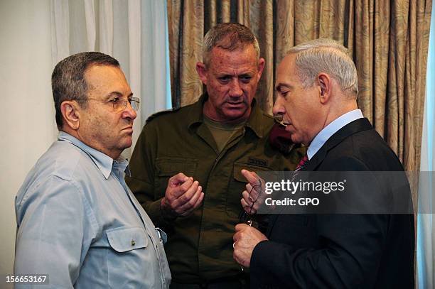 In this handout image provided by the Israeli Government Press Office , Prime Minister Benjamin Netanyahu speaks with IDF Chief of Staff Lt.-Gen....