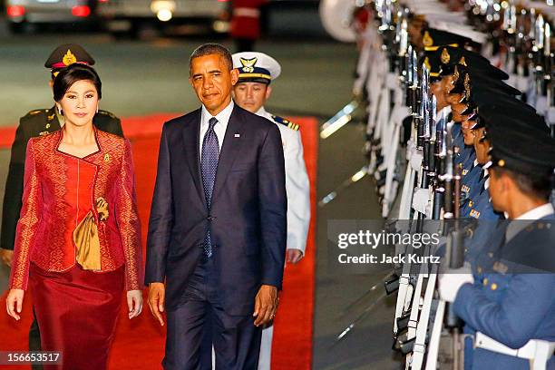 President Barack Obama and Yingluck Shinawatra, Prime Minister of Thailand, review Thai troops during a welcoming ceremony for President Obama ,...