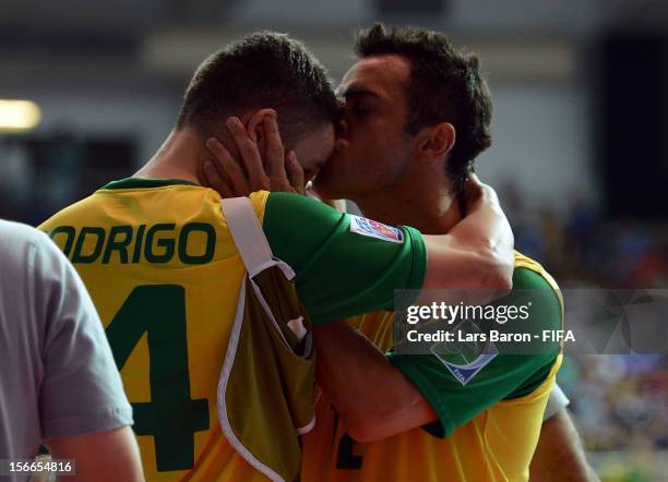 Falcao of Spain celebrates with team mate Rodrigo after scoring his teams second goal during the FIFA Futsal World Cup Final at Indoor Stadium...