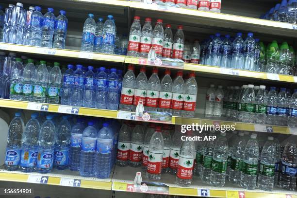 Picture shows a shelf full of various Chinese bottled water at a supermarket in Beijing on July 7, 2011. Authorities in Beijing have halted the sale...