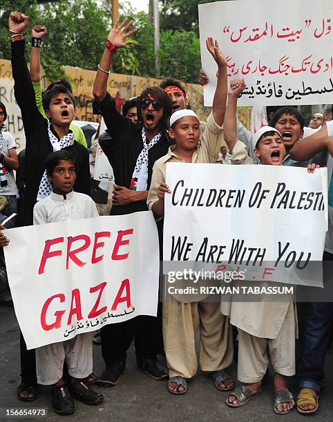 Activists of hardline Shiite group Palestine Foundation of Pakistan chant slogans against US and Israel during a protest in Karachi on November 18,...