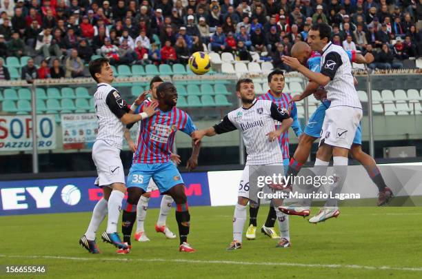 Sergio Almiron of Catania scores his team's opening goal during the Serie A match between Calcio Catania and AC Chievo Verona at Stadio Angelo...