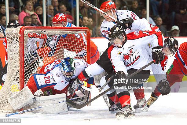 Andrei Makarov of team Russia stops the shot of Sam Fioretti of the WHL All-Stars skates during Game One of the WHL-Russia Subway Super Series on...