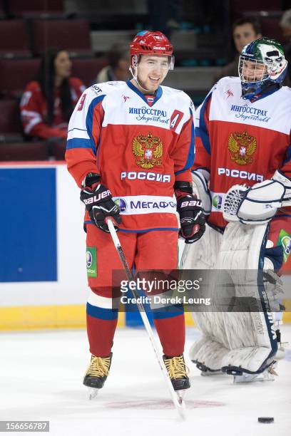 Nikita Nesterov and Andrei Makarov of team Russia skate during warm-ups before the game against the WHL All-Stars during Game One of the WHL-Russia...