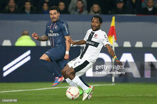 Ezequiel Lavezzi of PSG and Jean Makoun of Rennes in action during the french Ligue 1 match between Paris Saint Germain FC and Stade Rennais FC at...