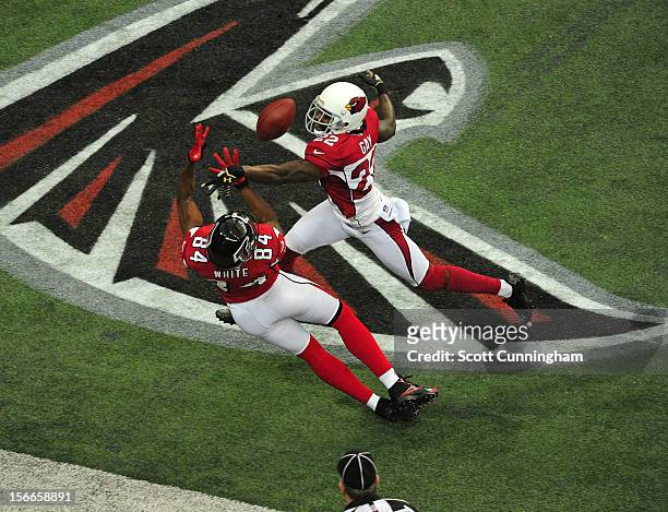 Roddy White of the Atlanta Falcons makes a catch against William Gay of the Arizona Cardinals at the Georgia Dome on November 18, 2012 in Atlanta,...