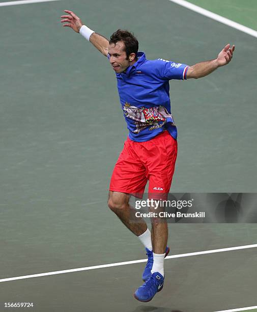 Radek Stepanek of Czech Republic jumps for joy to the crowd after celebrating match point against Nicolas Almagro of Spain during day three of the...