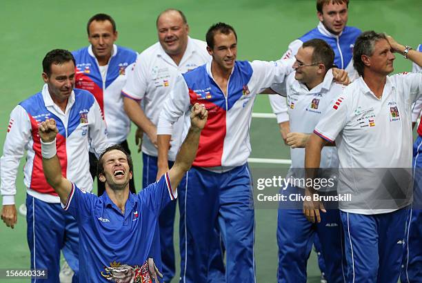 Radek Stepanek of Czech Republic celebrates with his team mates after celebrating match point against Nicolas Almagro of Spain during day three of...