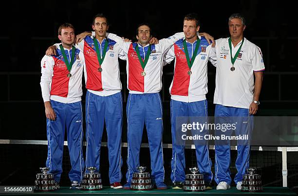 Ivo Minar,Lukas Rosol,Radek Stepanek,Tomas Berdych and team captain Jaroslav Navratil of Czech Republic on the rostrum with their winners medals...